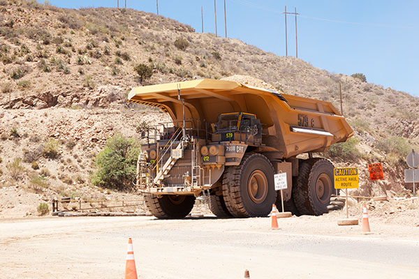 Caterpillar 793B Trucks crossing US 191, Freeport-McMoran Copper & Gold, Morenci, Arizona