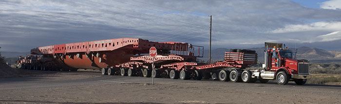 Trucks Hauling Large Autoclave