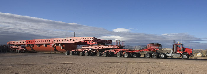 Trucks Hauling Large Autoclave