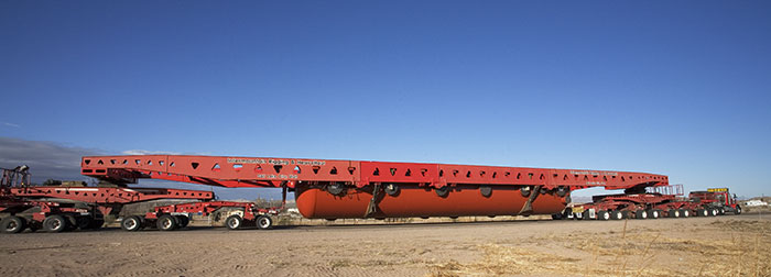 Trucks Hauling Large Autoclave