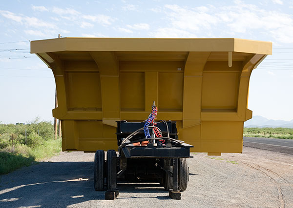 Mine truck bed on truck trailer