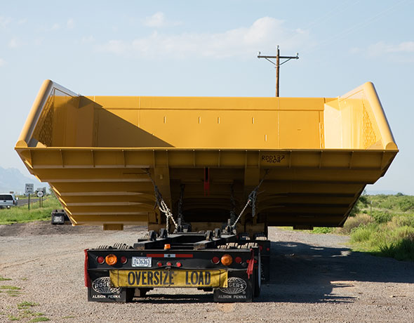 Mine truck bed on truck trailer