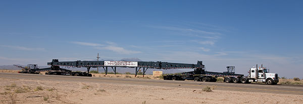 Truck with specialty heavy trailer