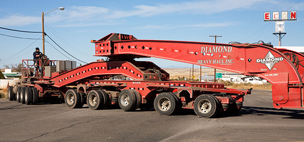 Truck with specialty heavy trailer