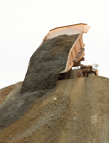 Mine Truck dumping Waste 