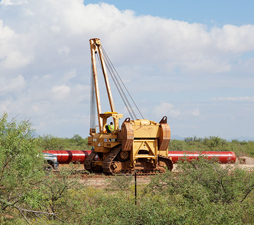 Caterpillar 587T sideboom pipelayer holding 3 ft pipe  Arizona