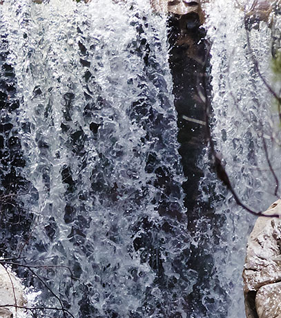 Water flowing over Dam at John Hand Campground, Cave Creek, Chiricahua Mountains, Arizona