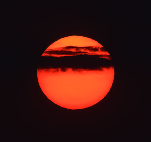 Sunrise on very smoky morning  